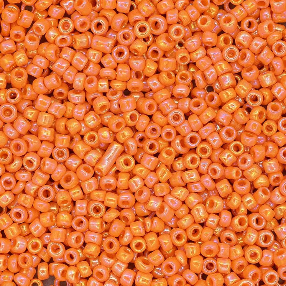 Бисер Астра 11/0, 20г (410 оранжевый/непрозр.радужный) фото 1 — PalitraMastera